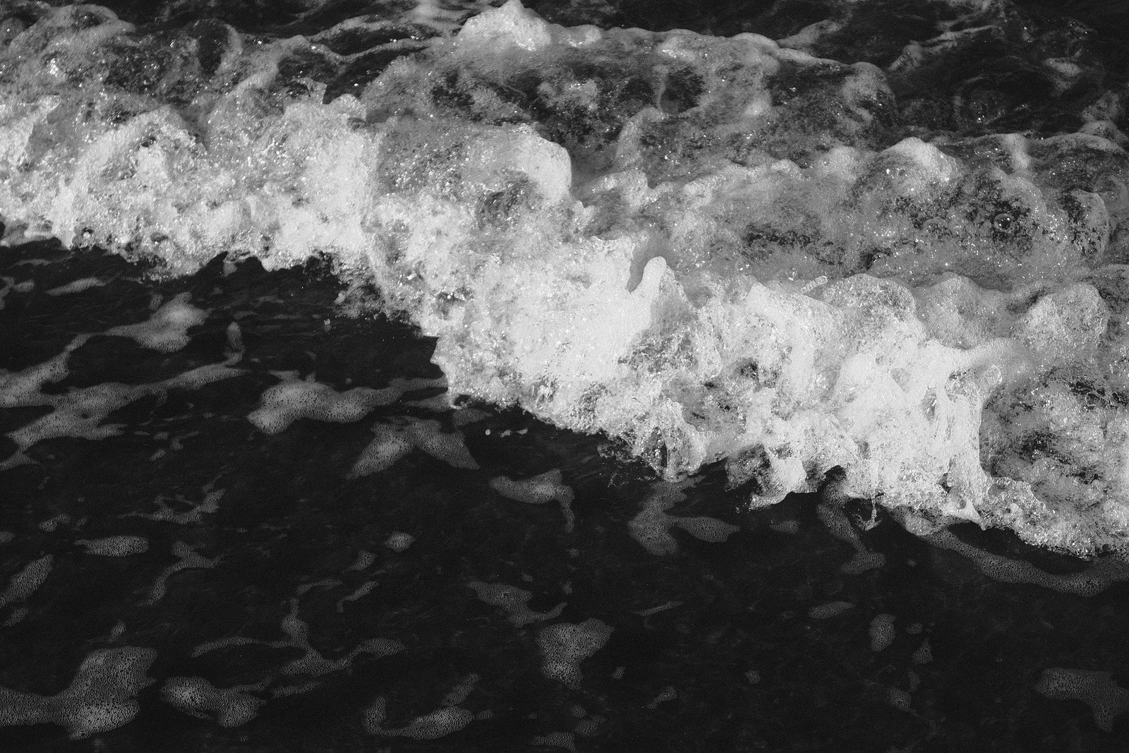 a wave in dramatic monochrome