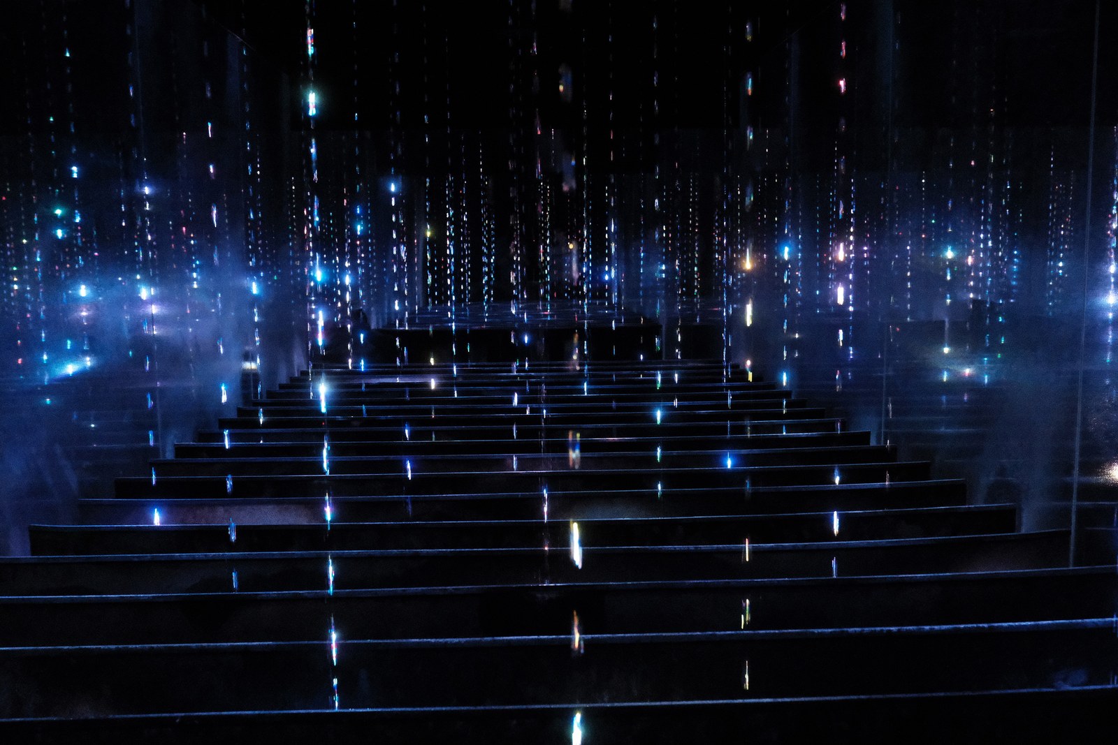 Cyberpunk City at night. ...or drops of water with cool lighting and fog at teamLabs planets, Tokyo